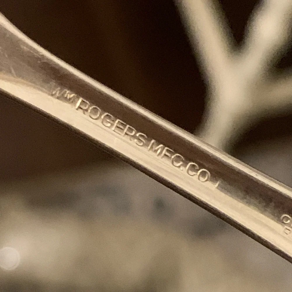 Vintage silver spreader knives